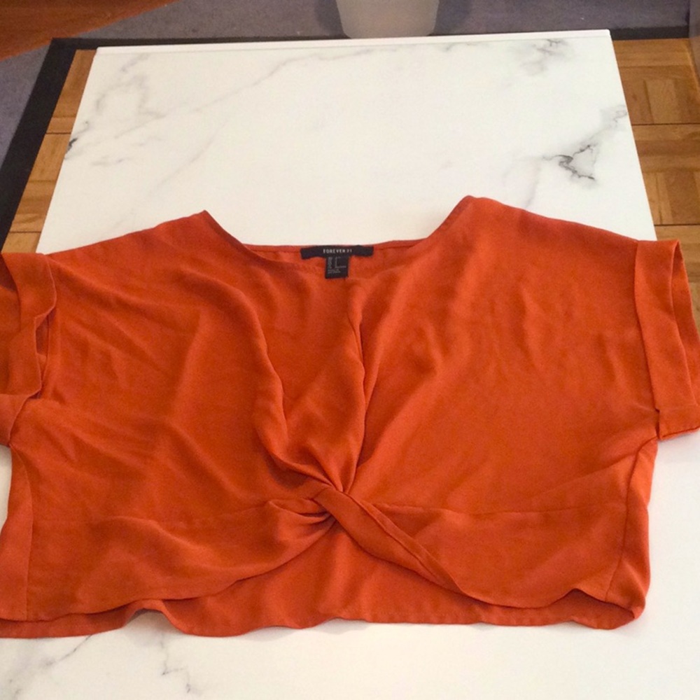Forever 21 orange crop top, size small.